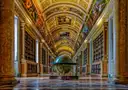The Diana Gallery inside the Château de Fontainebleau, painted vaults above a long library
