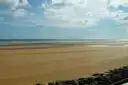 The sand of Juno Beach in Normandy at low tide