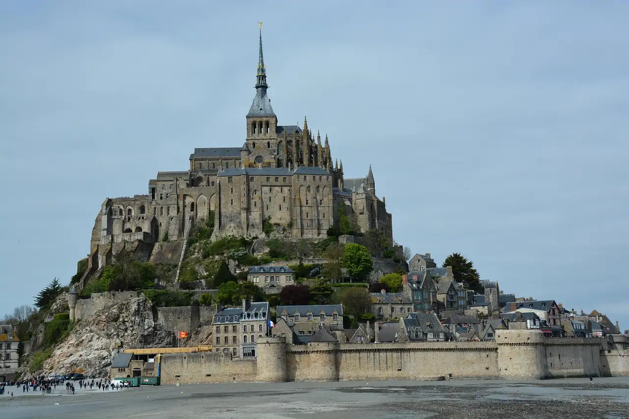 Mont-Saint-Michel's abbey, village and ramparts rising above the tidal flats