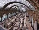 The long main hall of the Musée d'Orsay under its arched glass roof