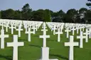 Rows of white marble crosses at the Normandy American Cemetery