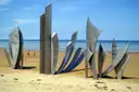 The steel Les Braves memorial on the sand of Omaha Beach, Normandy