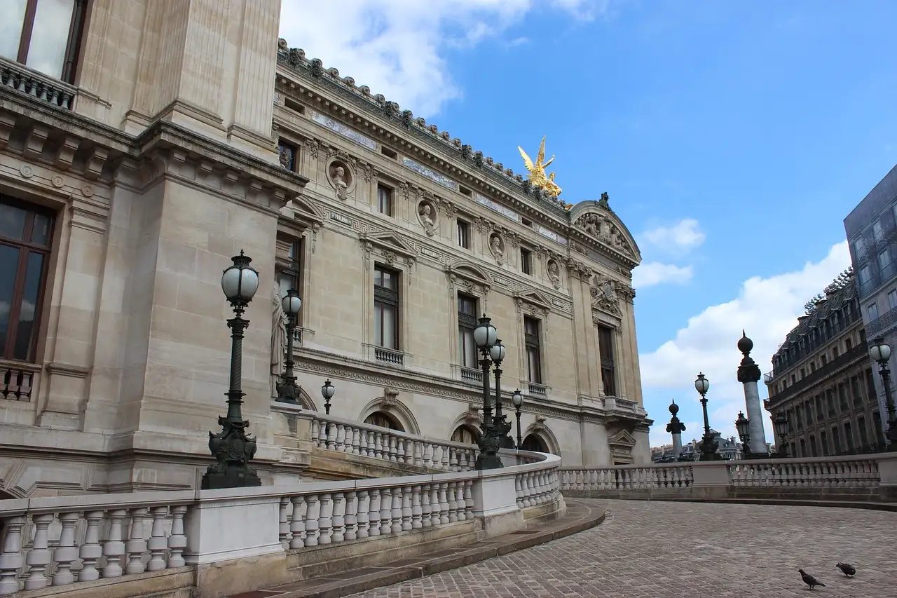 The side of the Palais Garnier under a blue sky