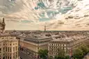 Paris rooftops with the Eiffel Tower in the distance