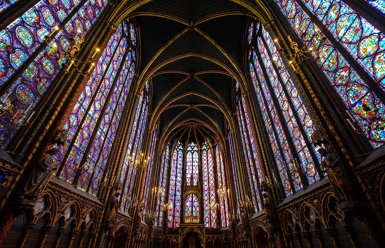 The apse of Sainte-Chapelle ringed by tall stained-glass windows