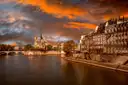 The Seine at sunset with Île Saint-Louis and Notre-Dame in the distance