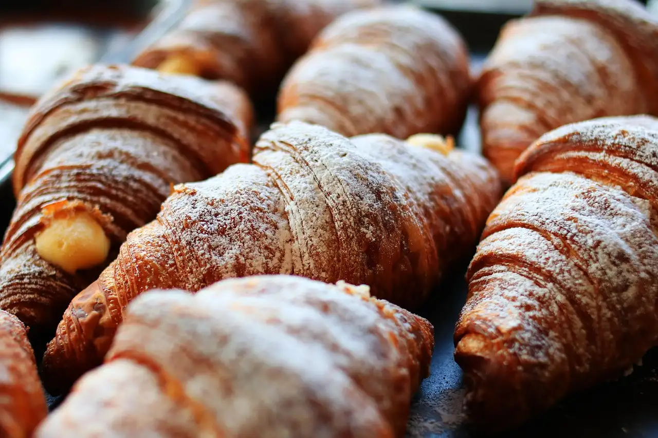 Croissants dusted with powdered sugar