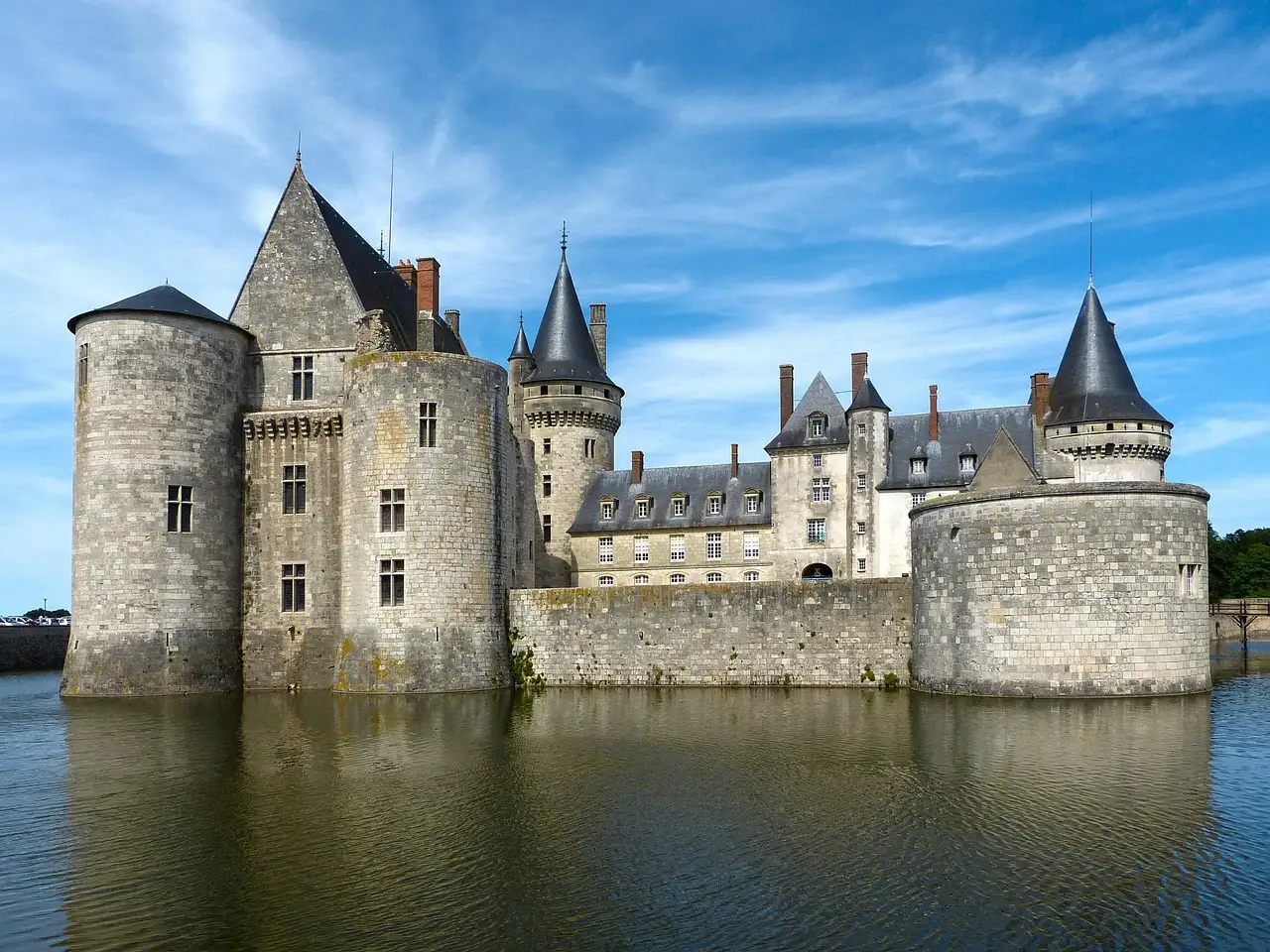 The Château de Sully-sur-Loire reflected in its moat