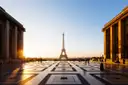The Eiffel Tower framed by the Trocadéro pavilions at sunrise