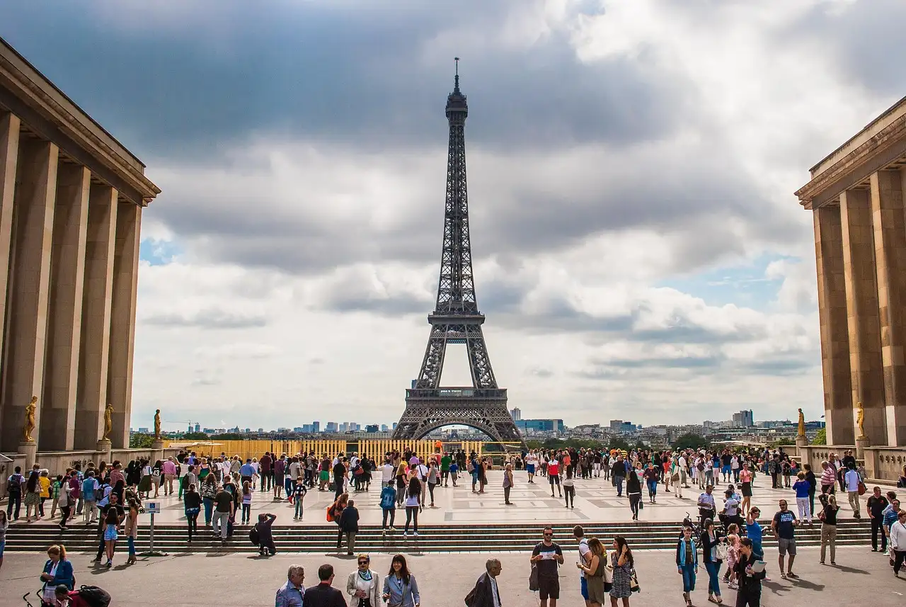 The Eiffel Tower seen from the Trocadéro esplanade, with crowds of visitors