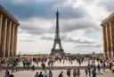 The Eiffel Tower seen from the Trocadéro esplanade, with crowds of visitors