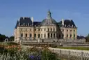 The Château de Vaux-le-Vicomte with colourful flower beds in front