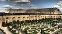 The Orangerie parterre's scrolled hedges below the south wing of the Palace of Versailles